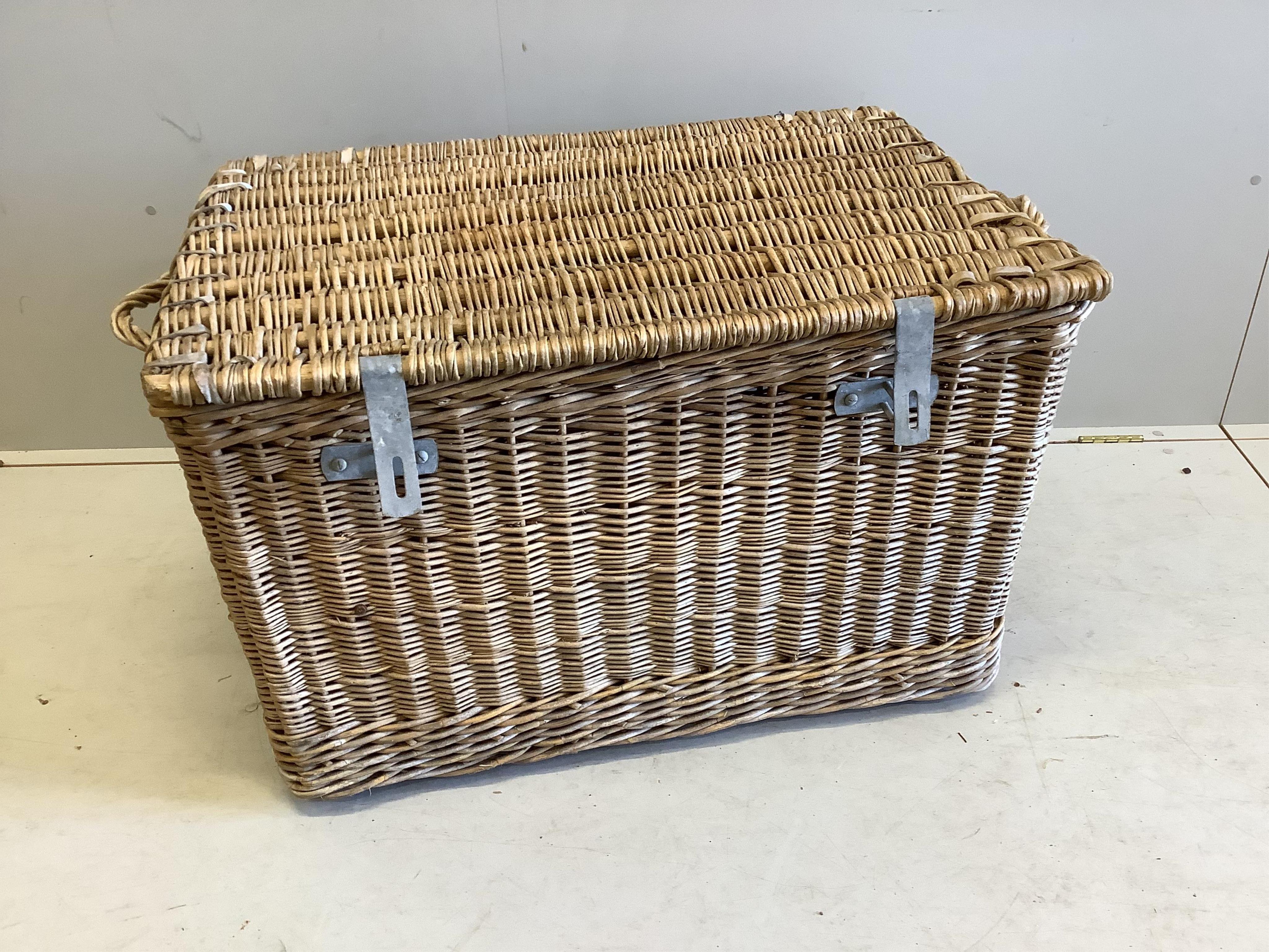 A vintage wicker laundry basket, width 96cm, depth 63cm, height 61cm
